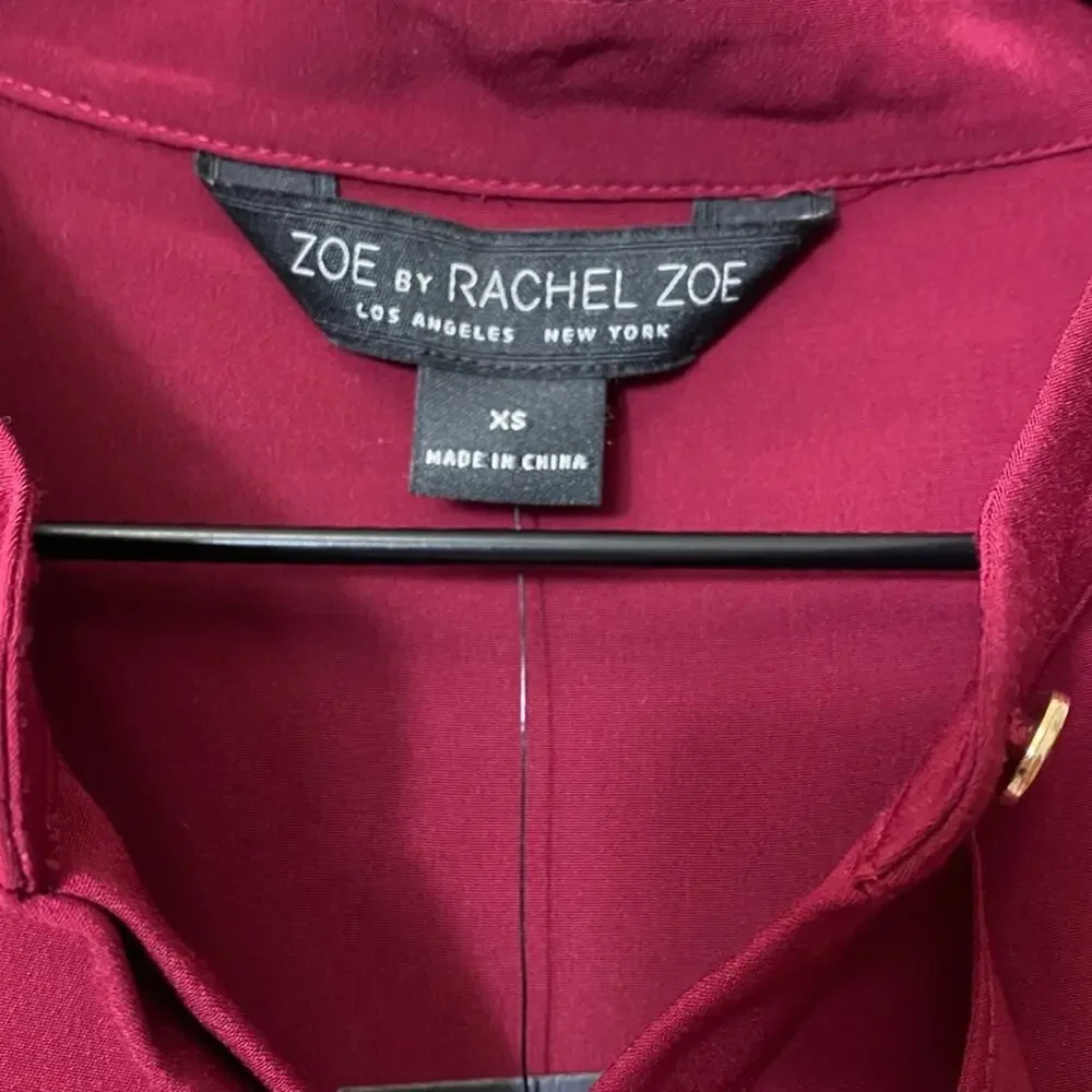 ZOE BY RACHEL Womens Budgundy Ruffled Peplum Top SIZE XS BRAND NEW WITH TAGS